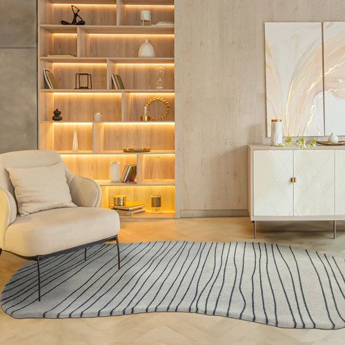 Minimalismo Quente: Sala Clean com Tapete de Textura Aconchegante - detalhe