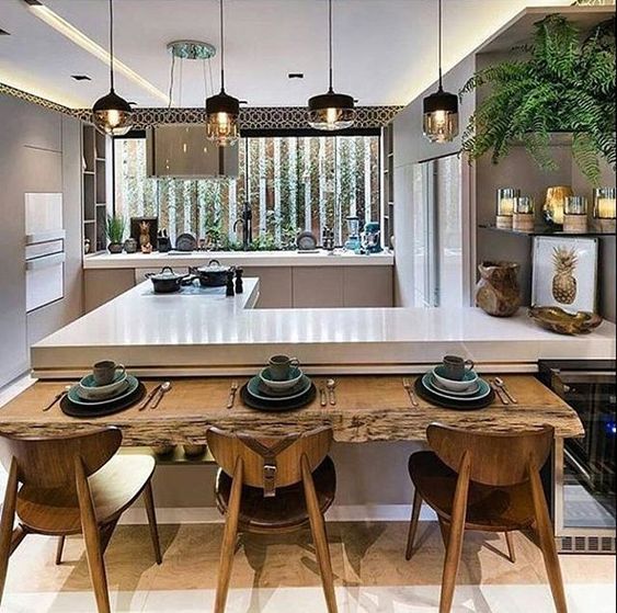 Cozinha Americana com Bancada Estendida para Refeições Rápidas: Praticidade e Convivência - ideia