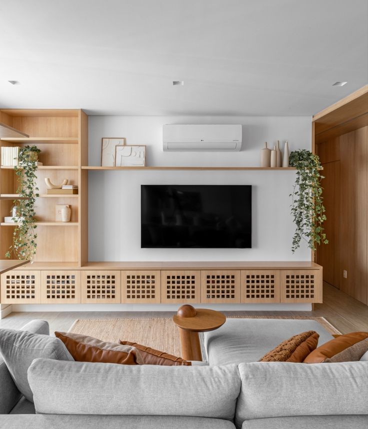 Aconchego Tátil: Sala de TV Decorada com Texturas Naturais - inspiração