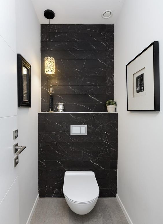 Banheiro Dramático: Preto e Branco, Texturas Marcantes e Iluminação Cênica - detalhe