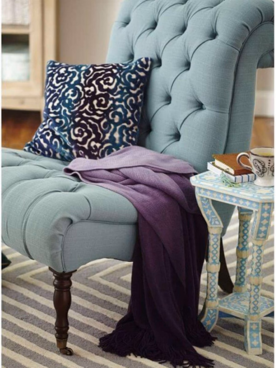 Poltrona com Capitonê: Sofisticação e Conforto Atemporal - ideia