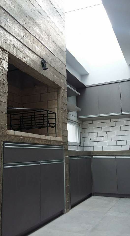 Elegância Urbana: Cimento Queimado e Concreto Aparente - detalhe